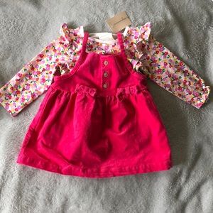 Corduroy dress and flowered shirt